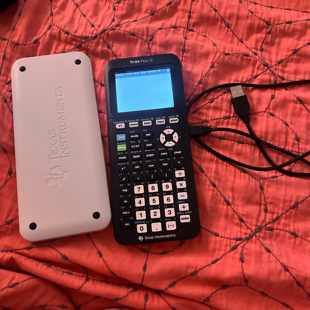 Texas Instruments TI-84 Plus CE in Black with White Cover